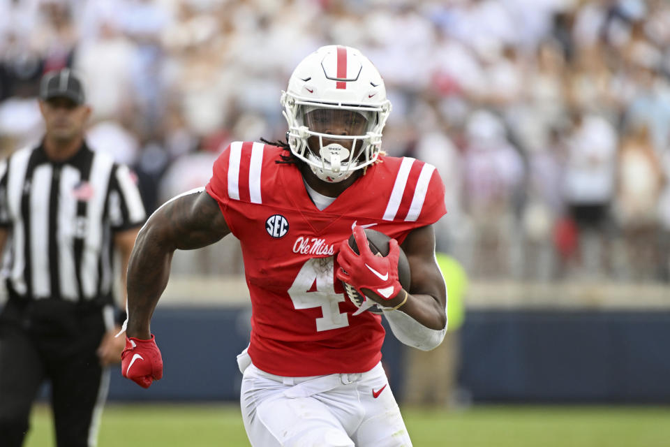 Mississippi running back Quinshon Judkins (4) runs the ball during the first half of an NCAA college football game against Mercer in Oxford, Miss., Saturday, Sept. 2, 2023. (AP Photo/Thomas Graning)