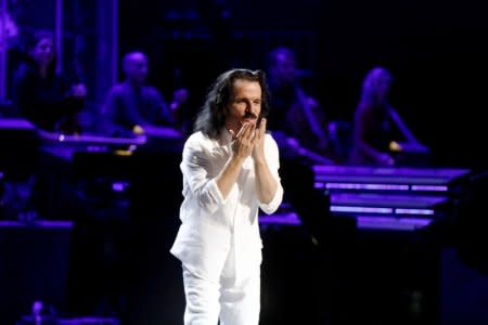 FILE PHOTO: Composer Yanni reacts during the concert at Princess Nourah bint Abdulrahman University in Riyadh, Saudi Arabia, December 3, 2017. REUTERS/Faisal Al Nasser/File Photo