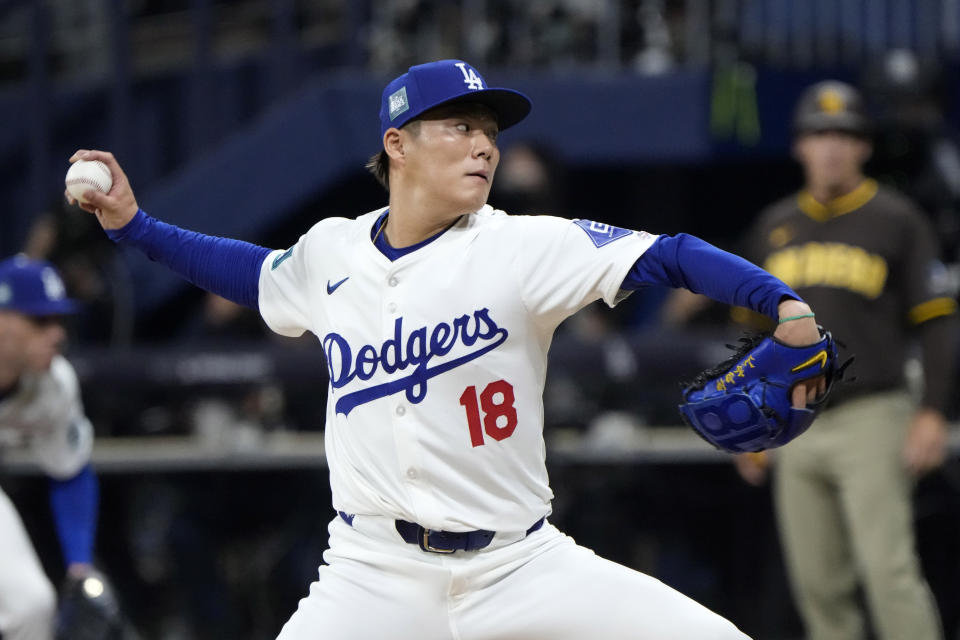 Los Angeles Dodgers starting pitcher Yoshinobu Yamamoto throws to the plate during the first inning of a baseball game against the San Diego Padres at the Gocheok Sky Dome in Seoul, South Korea Thursday, March 21, 2024, in Seoul, South Korea. (AP Photo/Ahn Young-joon)