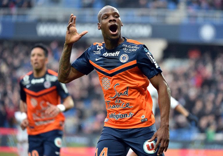 Montpellier's French midfielder Bryan Dabo celebrates after scoring a goal during the French L1 football match between Montpellier and Nice on March 1, 2015 at the la Mosson Stadium in Montpellier