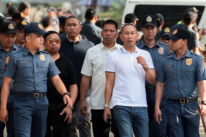 Filipino Congressman Esmael "Toto" Mangudadatu, whose wife was killed in the 2009 Maguindanao Massacre in southern Philippines, arrives for the promulgation of the case in Taguig City