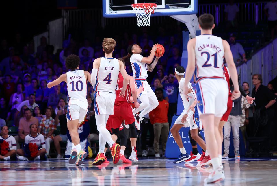 Kansas guard Bobby Pettiford Jr. (0) hits the game winning shot Thursday to beat Wisconsin in overtime at Imperial Arena in the Battle 4 Atlantis tournament in the Bahamas.