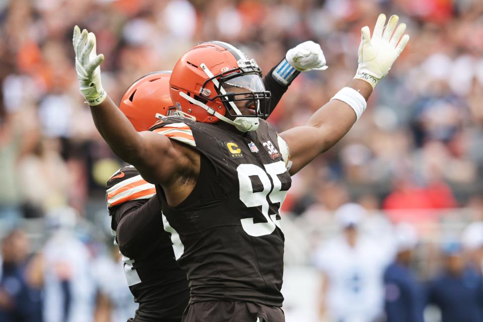 Cleveland Browns defensive end Myles Garrett (95) celebrates after sacking Tennessee Titans quarterback Ryan Tannehill (not pictured) during the second half Sunday in Cleveland.