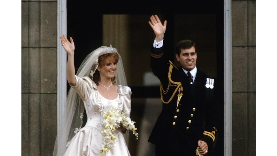 Sarah Ferguson and Prince Andrew waving from a balcony