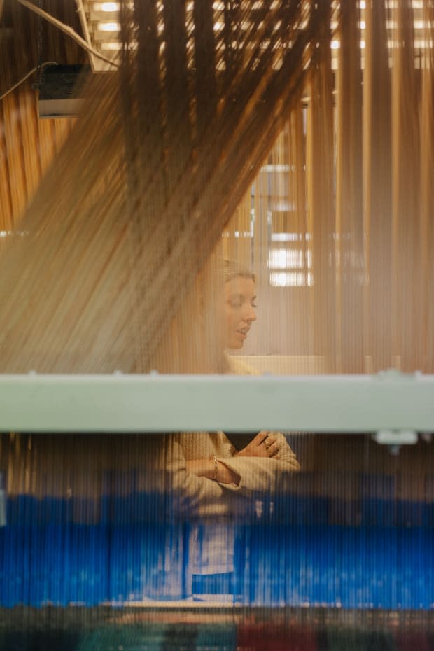 Hewitt visiting one of her line's fabric production partners. Photo: <em>Motion Sickness/Courtesy of Somewhere</em>