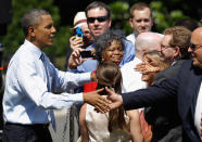 WASHINGTON, DC - JUNE 08: U.S. President Barack Obama welcomes guests of the National Football League Super Bowl champions New York Giants to the White House June 8, 2012 in Washington, DC. The Giants defeated The New England Patriots 21-17 to win Super Bowl XXXXVI. (Photo by Chip Somodevilla/Getty Images)