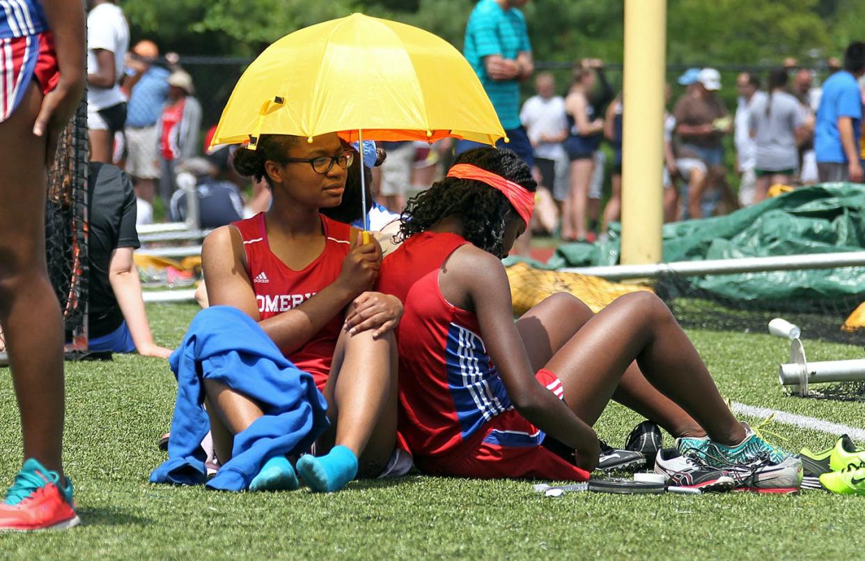 Many young athletes spend hours in the hot sun every day. <a href="https://www.gettyimages.com/detail/news-photo/iodine-felix-and-lourdes-jean-louis-of-somerville-hide-from-news-photo/1340406417" rel="nofollow noopener" target="_blank" data-ylk="slk:Nancy Lane/MediaNews Group/Boston Herald via Getty Images;elm:context_link;itc:0;sec:content-canvas" class="link ">Nancy Lane/MediaNews Group/Boston Herald via Getty Images</a>