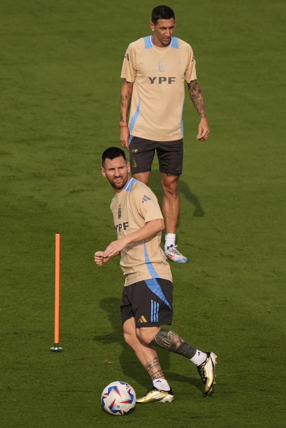 Lionel Messi, bottom, works out with his team, Argentina, before a COPA soccer match, Monday, June 17, 2024, in Kennesaw, Ga. Argentina plays team Canada on June 20, in Atlanta. (AP Photo/Mike Stewart)