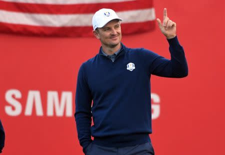 Sep 30, 2016; Chaska, MN, USA; Justin Rose of England reacts on the first tee in the morning foursome matches during the 41st Ryder Cup at Hazeltine National Golf Club. Mandatory Credit: Michael Madrid-USA TODAY Sports