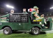 Sep 9, 2018; Green Bay, WI, USA; Green Bay Packers quarterback Aaron Rodgers is carted off the field following a second quarter injury against the Chicago Bears at Lambeau Field. Mandatory Credit: William Glasheen/Appleton Post-Crescent via USA TODAY NETWORK