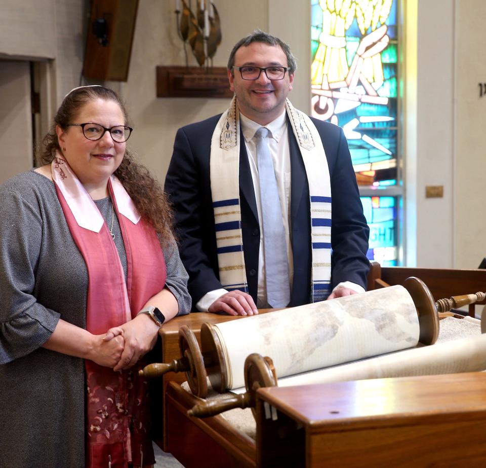 Rabbi Melinda Panken and newly installed Assistant Rabbi Jonathan Falco are shown with a Torah scroll at Temple Shaari Emeth in Marlboro Wednesday afternoon, November 2, 2022.  Their shul is taking over congregants from Temple Rodeph Torah in Marlboro, which closed.
