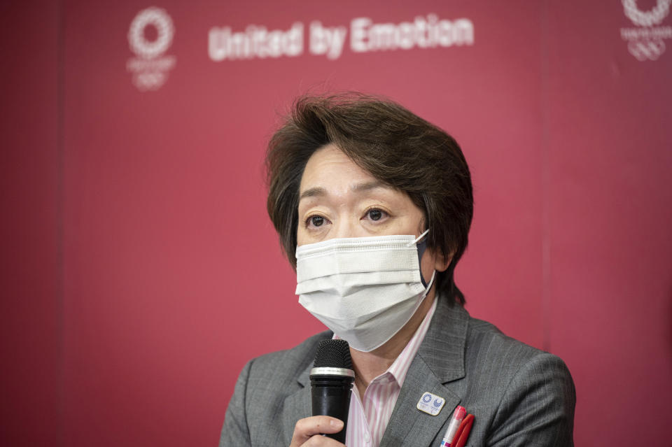 Seiko Hashimoto, president of Tokyo 2020, attends a media huddle following the IOC Executive Board Meeting at the Tokyo 2020 headquarters in Tokyo, Wednesday, April 21, 2021. (Philip Fong/ Pool Photo via AP)