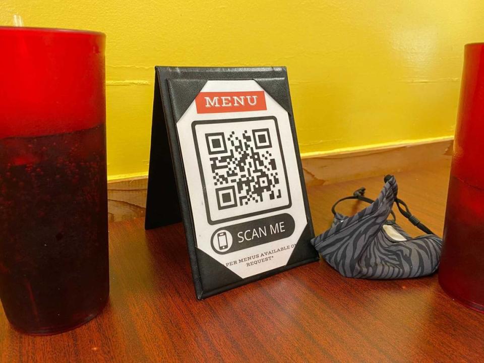 Many restaurants, including the Taqueria Becerra in Versailles, have switched to electronic menus that customers can view on their phones. This change was implemented during the COVID pandemic but is popular because it allows for easy updates.