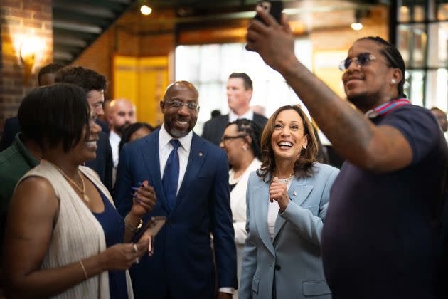 Vice President Kamala Harris, the presumptive Democratic presidential nominee, poses for a selfie Tuesday while visiting Paschal's, a historic black-owned restaurant in Atlanta, before appearing at a campaign rally that evening.