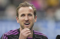 Bayern's Harry Kane reacts after an injury during a German Bundesliga soccer match between SV Darmstadt 98 and Bayern Munich in Darmstadt, Germany, Saturday, March 16, 2024. (AP Photo/Michael Probst)