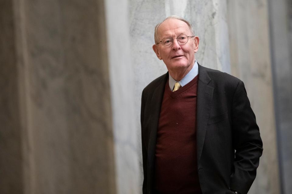 Sen. Lamar Alexander, R-Tenn., arrives on Capitol Hill in Washington, Thursday, Jan. 30, 2020, before the impeachment trial of President Donald Trump on charges of abuse of power and obstruction of Congress.