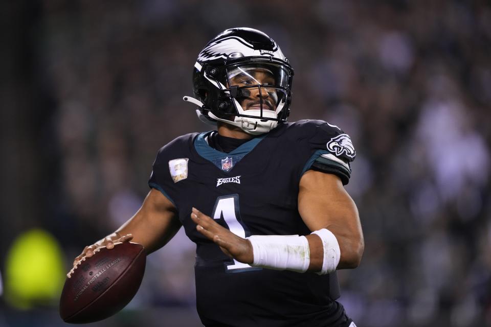 Philadelphia Eagles quarterback Jalen Hurts throws during the first half of an NFL football game against the Green Bay Packers, Sunday, Nov. 27, 2022, in Philadelphia. (AP Photo/Matt Rourke)