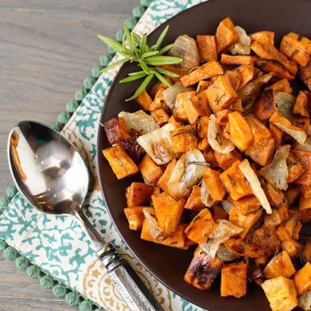 <p>Make your sweet potatoes that much more interesting with just a touch of rosemary, olive oil, and black pepper. </p><p><strong>Get the recipe at <a rel="nofollow noopener" href="http://www.garnishwithlemon.com/rosemary-roasted-sweet-potatoes-and-onions/" target="_blank" data-ylk="slk:Garnish With Lemon;elm:context_link;itc:0;sec:content-canvas" class="link ">Garnish With Lemon</a>. </strong></p>