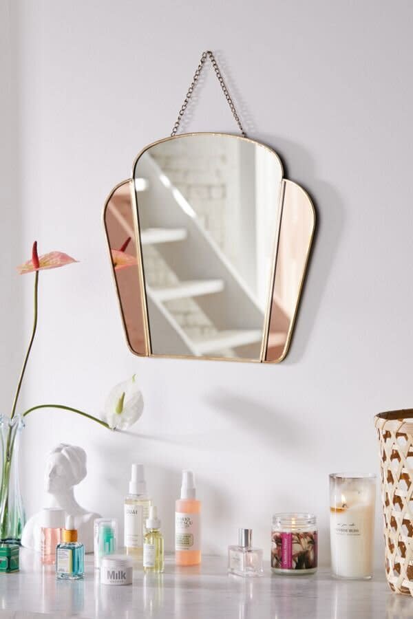 You can look back to the past with this Art Deco-inspired mirror. <a href="https://fave.co/35sUMT3" target="_blank" rel="noopener noreferrer"><strong>Find this mirror at Urban Outfitters</strong></a>. (Photo: Urban Outfitters)