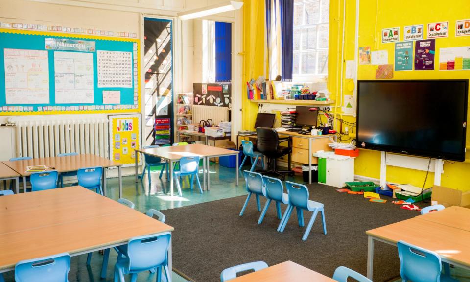 <span>An empty classroom during lockdown. The study said learning losses would harm the prospects of children aged five at the time of closures.</span><span>Photograph: Graeme Robertson/The Guardian</span>