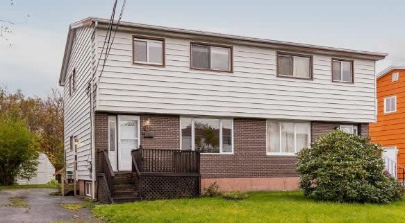 The duplex jointly owned by Arlene Best and her family on Marilyn Drive in Dartmouth. Best has run into unexpected costs attempting to subdivide the units. 