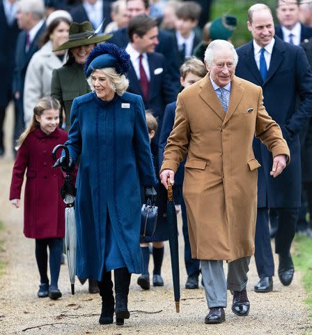 <p>Samir Hussein/WireImage</p> Queen Camilla and King Charles attend the Christmas Day service at St Mary Magdalene Church on December 25, 2022.