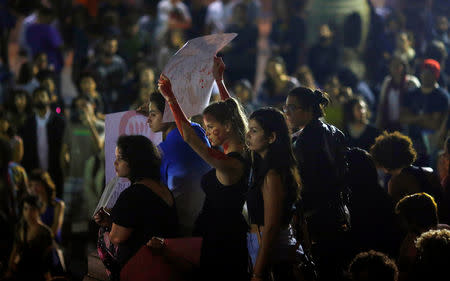 Demonstrators attend a protest against rape and violence against women in Rio de Janeiro, Brazil, May 27, 2016. REUTERS/Ricardo Moraes