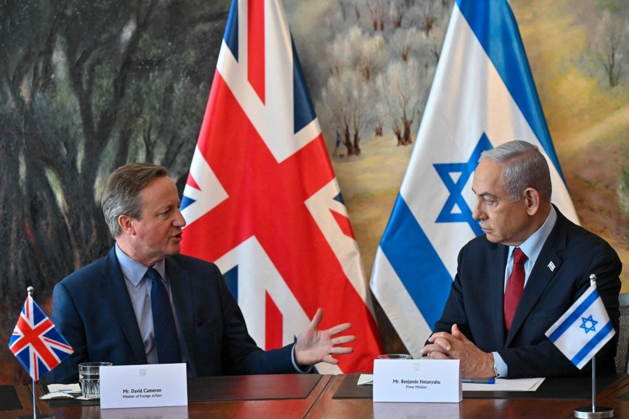 JERUSALEM - NOVEMBER 23: (----EDITORIAL USE ONLY - MANDATORY CREDIT - 'ISRAELI GOVERNMENT PRESS OFFICE (GPO) / HANDOUT' - NO MARKETING NO ADVERTISING CAMPAIGNS - DISTRIBUTED AS A SERVICE TO CLIENTS----) Israeli Prime Minister Benjamin Netanyahu (R) hosts UK Secretary of State for Foreign Affairs David Cameron (L) in Jerusalem on November 23, 2023. (Photo by Israeli Government (GPO) / Handout/Anadolu via Getty Images)