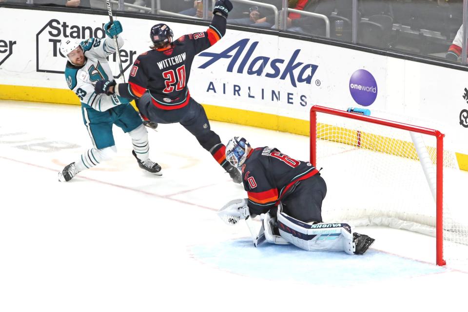 Coachella Valley Firebirds goaltender Chris Driedger (60) makes a save against San Jose Barracuda at Acrisure Arena in Palm Desert, Calif., on Monday, Feb. 27, 2023.