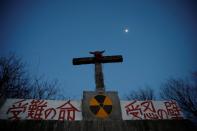 The Wider Image: The man who saves forgotten cats in Fukushima's nuclear zone