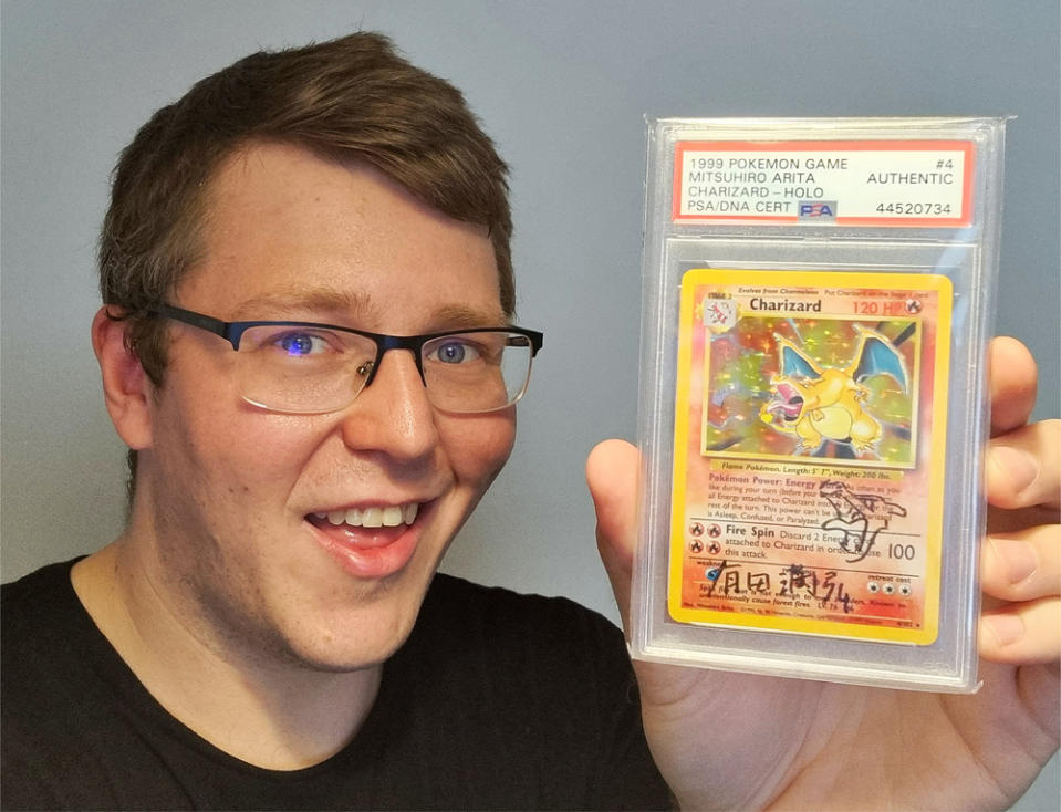 Stephen L. Kent, 32, with his favourite PSA Graded original Base Set Charizard card, signed by the original artist Mitsuhiro Arita (Collect/PA Real Life)