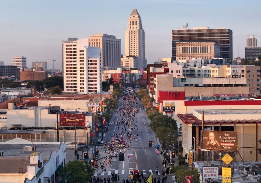 LOS ANGELES, CA MARCH 17: The LA Marathon makes its way onto Broadway in Chinatown at the two-mile mark on Sunday, March 17, 2024. Over 25,000 runners competed this year. (Myung J. Chun / Los Angeles Times via Getty Images)