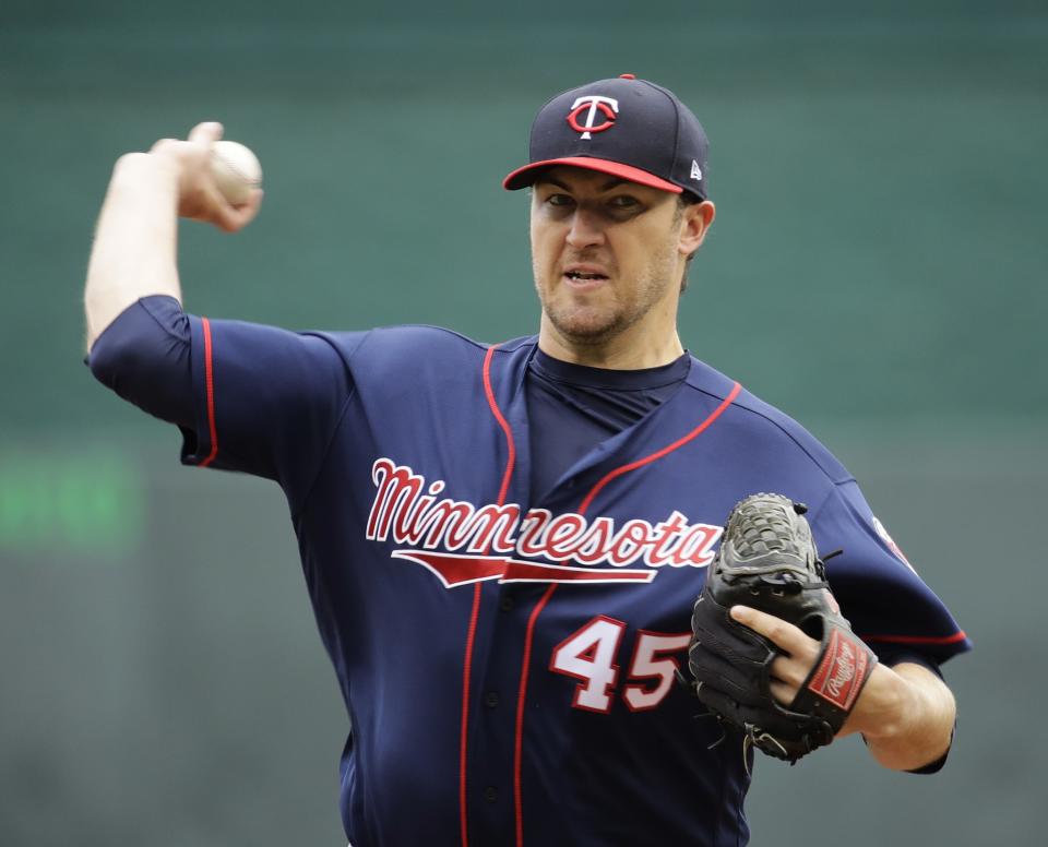 Phil Hughes is back in the Twins rotation after surgery last year. (AP)