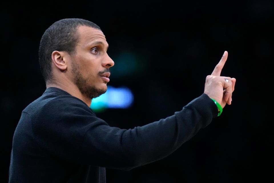 Boston Celtics head coach Joe Mazzulla calls to his players during the first half of an NBA basketball game against the Phoenix Suns, Thursday, March 14, 2024, in Boston. (AP Photo/Charles Krupa)