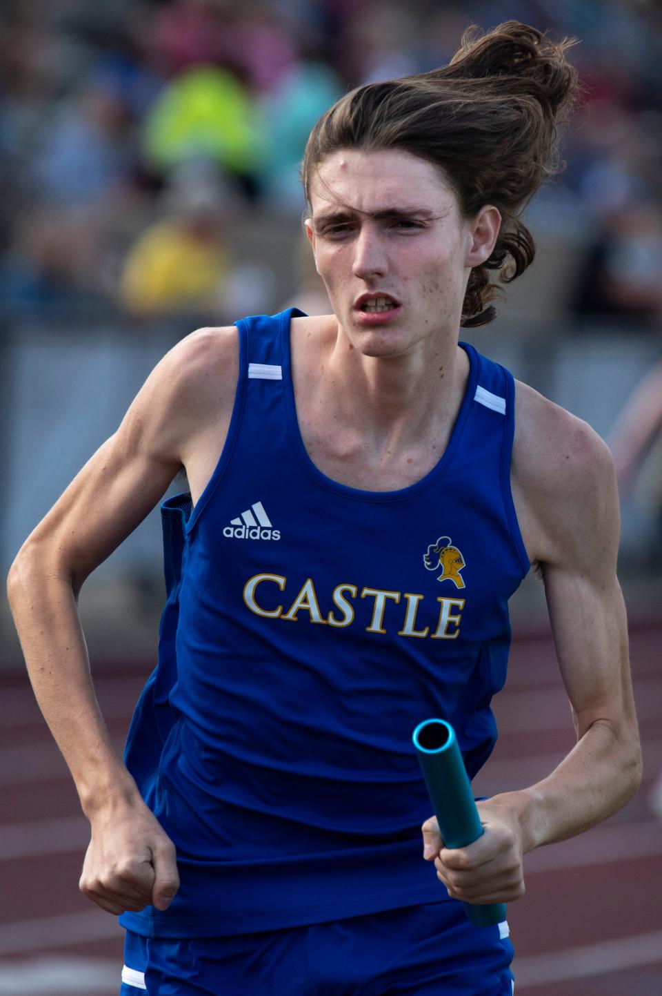 Castle's Andrew Mangum competes in the 4x800 Meter Relay during the Evansville Central IHSAA Boys Regional Track & Field Meet at Central Stadium Thursday evening, May 26, 2022.