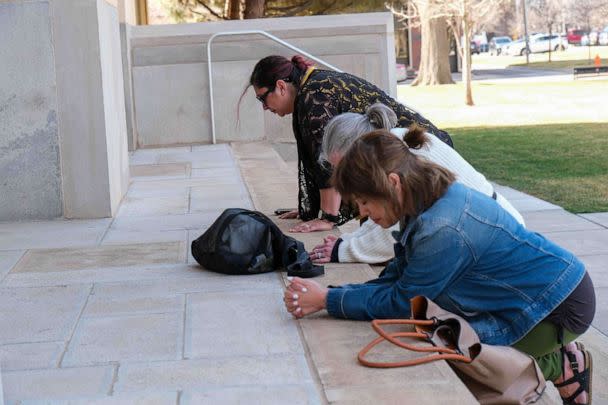 PHOTO: Anti-abortion protesters pray outside of the Potter County Courthouse in support of a case to stop medication abortion, in Amarillo, Texas, on March 15, 2023. (Michael Cuviello/Amarillo Globe-News via USA Today Network)