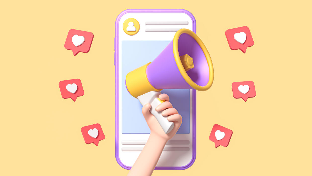  A megaphone in front of a smart phone surrounded by heart symbols 