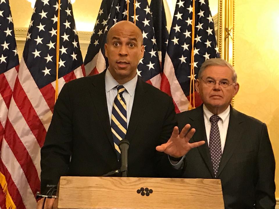 Sen. Cory Booker speaks at a May 23, 2017 news conference in the Capitol about health care with Sen. Bob Menendez.