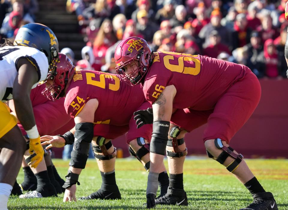 Iowa State offensive lineman Tyler Miller waits for the snap against West Virginia on Nov. 5, 2022.