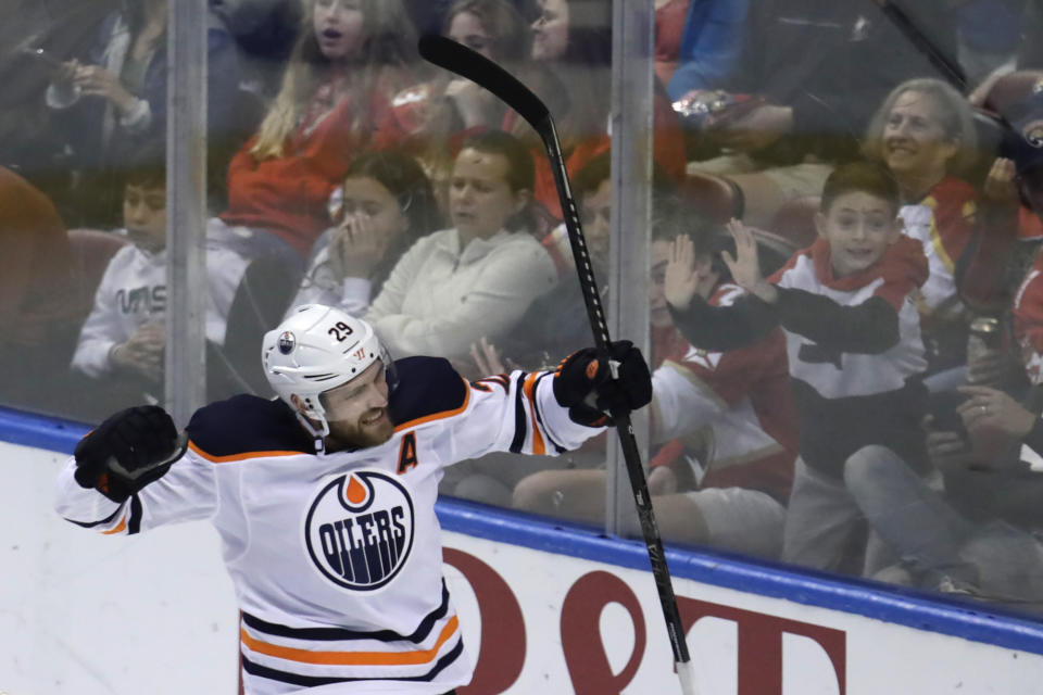 Edmonton Oilers center Leon Draisaitl (29) celebrates after scoring a goal during the third period of an NHL hockey game against the Florida Panthers, Saturday, Feb. 15, 2020, in Sunrise, Fla. (AP Photo/Lynne Sladky)