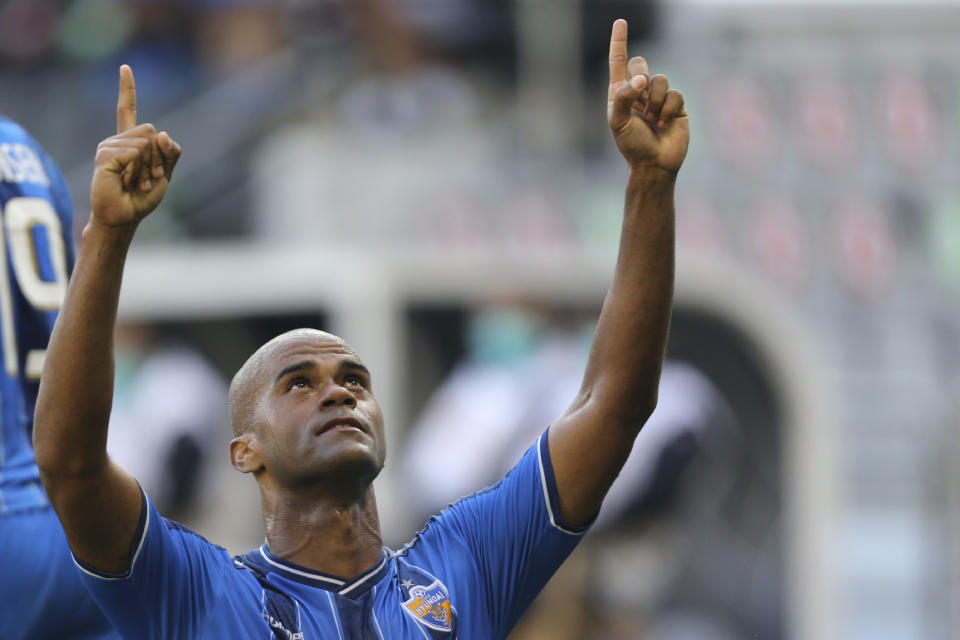 Ulsan Hyundai's Júnior Negrão celebrates after scoring his side's second goal from penalty spot during the Champions League semifinal soccer match between Vissel Kobe and Ulsan Hyundai FC at Jassim Bin Hamad Stadium in Doha, Qatar, Sunday, Dec. 13, 2020. (AP Photo/Hussein Sayed)