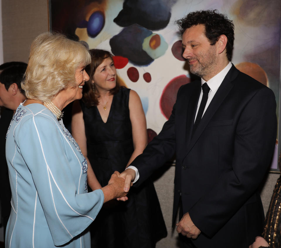 The Duchess of Cornwall speaks with Michael Sheen as she attends the NHS Heroes Awards at the London Hilton Hotel.