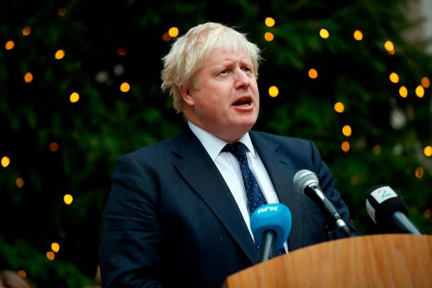 Boris Johnson speaks during the unveiling of a Christmas tree, gifted by Norway, outside The Foreign and Commonwealth Office  in 2019