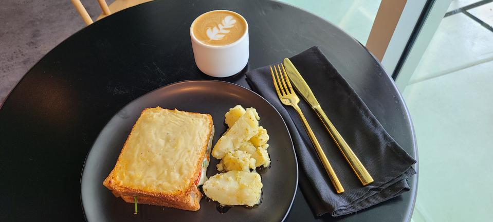 Wolfmoon's vegetarian croque and cappucino.