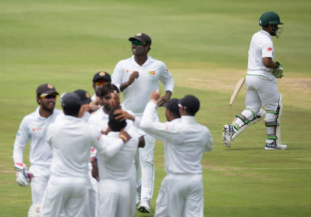 REFILE - ADDING RESTRICTIONS Cricket - South Africa v Sri Lanka - Third Test cricket match - Wanderers Stadium, Johannesburg, South Africa - 13/1/17 - Sri Lanka celebrate the wicket of South Africa’s Themba Bavuma. REUTERS/James Oatway