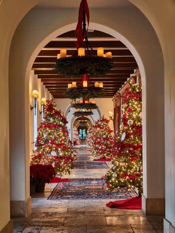 <p>Peter Frank Edwards</p> Classic holiday finery complements The Cloister’s signature grand arches and stately lobby.