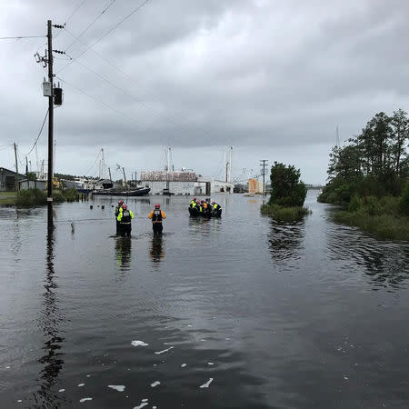 Urban Search and Rescue NY-TF1 Alpha team work with local officials to conduct wellness checks & an evacuation on Goose Creek Island in Pamlico County, North Carolina, U.S. September 15, 2018. NYC Emergency Management/Handout via REUTERS