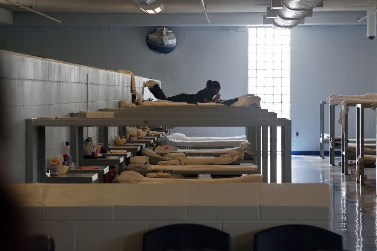 In this Aug. 2, 2011 photo, an inmate rests at Integrity House, a transitional housing/residential treatment area for women incarcerated at the Hudson County Correctional Center in Kearny, N.J. (Photo: Mel Evans/AP)