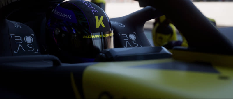  Driver in F1 car with helmet on driving for Konnersport 