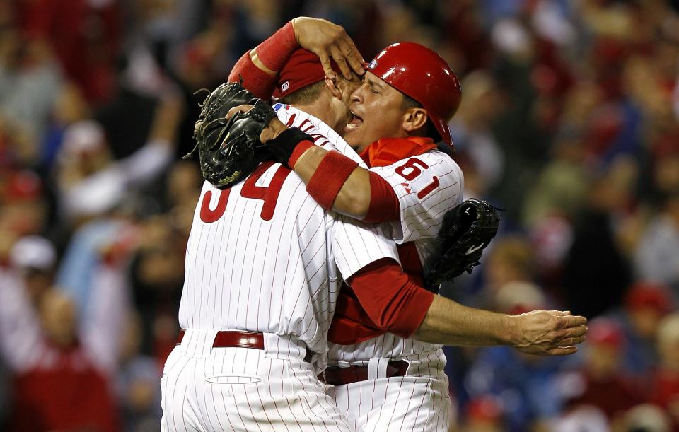 Roy Halladay and Carlos Ruiz celebrate Halladay's no-hitter.